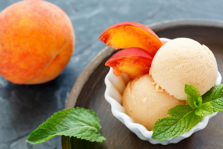 scoops of non-dairy peach ice cream